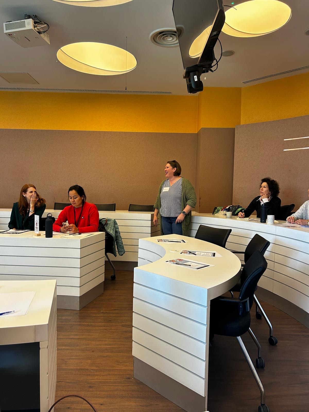 Kimberly teaching a room of small business owners about SEO and good graphics in Istanbul