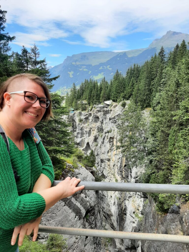 Kimberly standing over a ravine in Switzerland